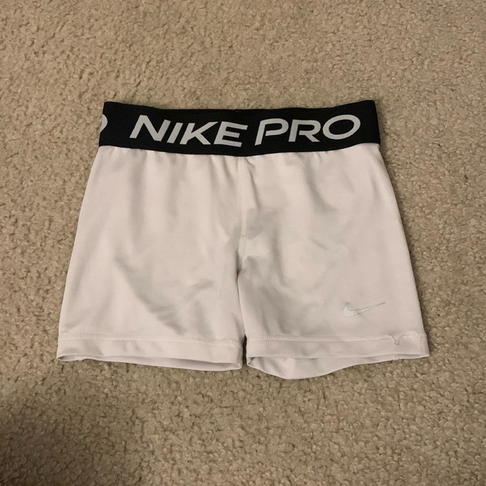 White Nike pros Chikd medium